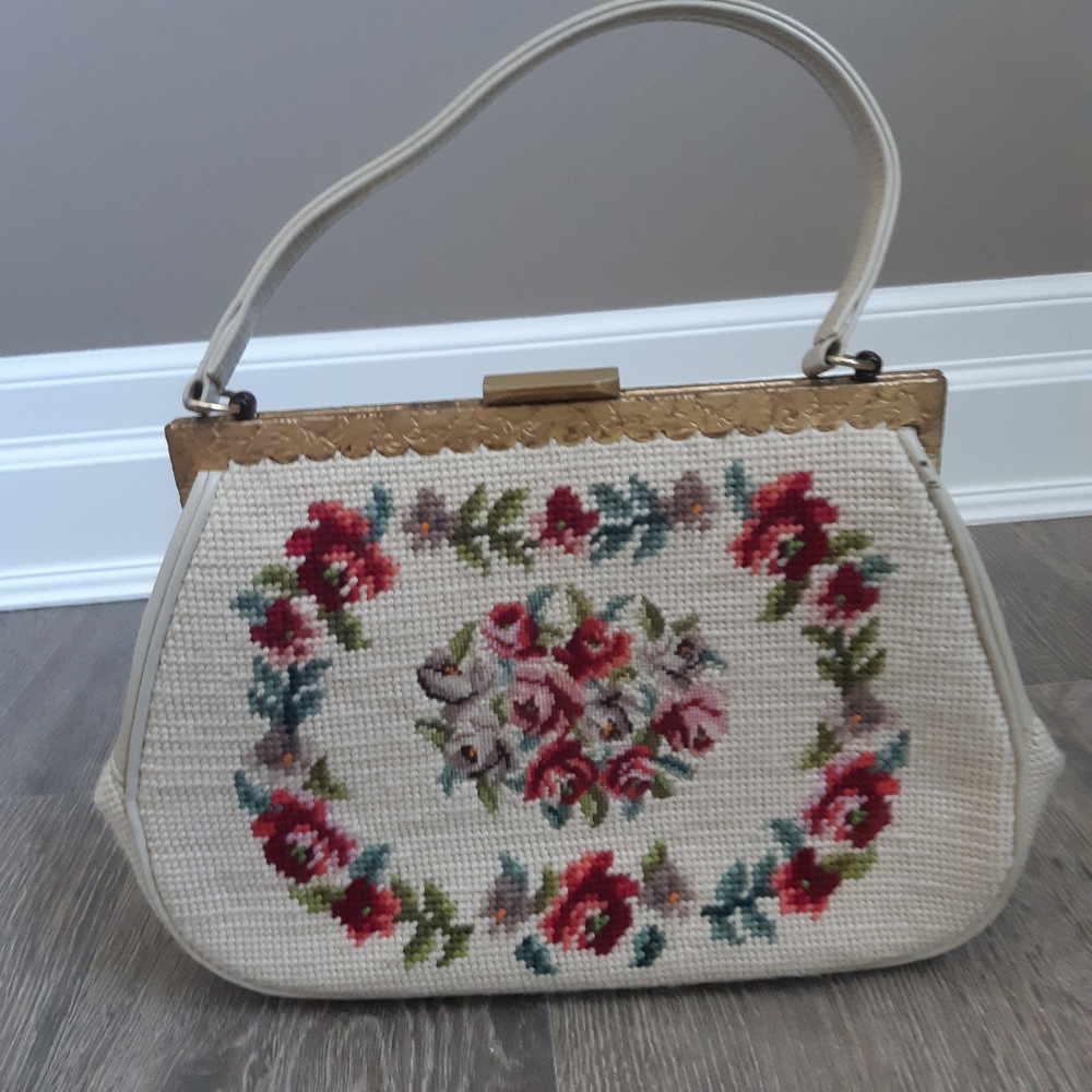 Vintage floral needle point tapestry bag.  Cream with a bright floral design.